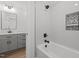 Bathroom with shower/tub combo and gray vanity at 184 Dereham Ln, Garner, NC 27529