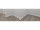 Clean and modern hallway with wood flooring at 184 Dereham Ln, Garner, NC 27529