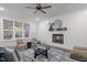 Living room with a fireplace and built-in shelving, creating a warm and inviting atmosphere at 184 Dereham Ln, Garner, NC 27529