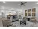 Open-concept living room with modern furnishings and seamless flow into the gourmet kitchen at 184 Dereham Ln, Garner, NC 27529
