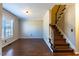 Elegant staircase with dark wood and white railings at 360 Sandy Ridge Rd, Dunn, NC 28334