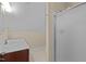 Clean, neutral bathroom featuring a single sink and shower at 5600 Thornburg Dr, Wake Forest, NC 27587