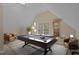 Bright, spacious bedroom with billiard table and natural light at 5600 Thornburg Dr, Wake Forest, NC 27587
