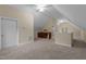 Spacious bonus room featuring neutral carpet and a wet bar at 5600 Thornburg Dr, Wake Forest, NC 27587
