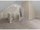 Spacious bonus room with neutral carpet and natural light at 5600 Thornburg Dr, Wake Forest, NC 27587