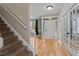 Home foyer featuring hardwood floors, and stairs at 5600 Thornburg Dr, Wake Forest, NC 27587