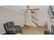 Living room with fireplace, ceiling fan, and access to deck at 208 Mallard Creek Dr # B, Graham, NC 27253