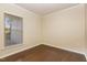 Cozy bedroom featuring plush carpet, a neutral color palette, and a bright window at 219 Rosedale Creek Dr, Durham, NC 27703