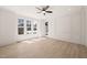 Spacious bedroom with windows and custom wall trim at 617 Darian Woods Dr, Holly Springs, NC 27540