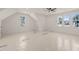 Large bedroom with vaulted ceilings, ceiling fan, and plenty of natural light at 617 Darian Woods Dr, Holly Springs, NC 27540