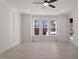 Bright dining room with hardwood floors and large windows at 617 Darian Woods Dr, Holly Springs, NC 27540