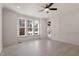 Bright dining room with hardwood floors and large windows at 617 Darian Woods Dr, Holly Springs, NC 27540