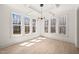 Bright dining area with recessed lights, a modern light fixture, and lots of windows at 617 Darian Woods Dr, Holly Springs, NC 27540