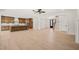 Spacious open floor plan combines the kitchen with island, living area, and entry way at 617 Darian Woods Dr, Holly Springs, NC 27540