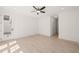 Airy living room with custom wall trim and a sunlit porch entrance at 617 Darian Woods Dr, Holly Springs, NC 27540
