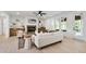 Comfortable living room with hardwood flooring, fireplace, built-ins, and backyard view at 617 Darian Woods Dr, Holly Springs, NC 27540