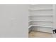 Walk-in pantry with adjustable shelving, ideal for organization and storage at 617 Darian Woods Dr, Holly Springs, NC 27540