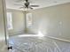 Bright bedroom with carpet flooring and two windows at 6648 Sheriff Watson Rd, Sanford, NC 27332