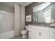 Bright bathroom with white vanity, granite countertop, shower and tub combination at 2325 Bay Minette Sta # 548, Apex, NC 27502