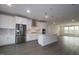 Stunning kitchen with stainless steel appliances, white cabinets, and a large island at 2325 Bay Minette Sta # 548, Apex, NC 27502