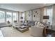 Spacious living room with stylish decor, large windows, and comfortable seating at 2325 Bay Minette Sta # 548, Apex, NC 27502