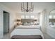 Main bedroom featuring a decorative chandelier and ample natural light at 2325 Bay Minette Sta # 548, Apex, NC 27502