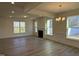 Bright living room with hardwood floors and fireplace at 244 Combine Trl # Dm 108, Benson, NC 27504