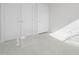 Bedroom with neutral carpet and two doors offers a bright, airy space at 324 Church St, Morrisville, NC 27560