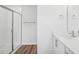Modern bathroom showcasing a glass-enclosed shower and sleek vanity with ample counter space at 622 Brittany Ct, Durham, NC 27703