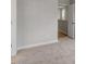 Bedroom with neutral carpeting and freshly painted walls with white trim at 672 Georgia'S Landing Pkwy # 69, Raleigh, NC 27603