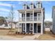 Newly built two-story home with modern siding and a well-maintained front yard at 672 Georgia'S Landing Pkwy # 69, Raleigh, NC 27603