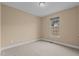 Bright bedroom with neutral walls and carpet at 131 Glasgow St, Stem, NC 27581