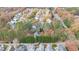Aerial view highlighting home's location within a quiet, tree-lined neighborhood at 1620 Dunn Rd, Raleigh, NC 27614