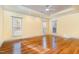 Bright bedroom with hardwood floors and multiple windows at 1620 Dunn Rd, Raleigh, NC 27614