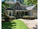 Two-story house with stone accents and landscaping at 1620 Dunn Rd, Raleigh, NC 27614