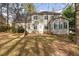 Two story house exterior with backyard and sunroom at 1620 Dunn Rd, Raleigh, NC 27614