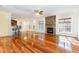 Open living room with hardwood floors and fireplace at 1620 Dunn Rd, Raleigh, NC 27614