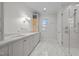 Elegant bathroom features marble countertops, a glass-enclosed shower, and stylish fixtures at 2642 Marchmont St, Raleigh, NC 27608