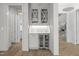 Butler's Pantry with beverage fridge, marble countertop and glass front cabinets at 2642 Marchmont St, Raleigh, NC 27608
