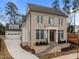 Stunning two-story brick home featuring a prominent front entrance and attached two-car garage at 2642 Marchmont St, Raleigh, NC 27608
