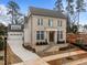 Stunning two-story brick home featuring a prominent front entrance and attached two-car garage at 2642 Marchmont St, Raleigh, NC 27608
