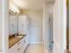 Bathroom featuring double sinks and a glass-enclosed shower at 2729 Hunter Woods Dr # 568, Apex, NC 27502