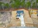 An aerial view of a two-story home featuring a lush surrounding forest at 320 Duncan Creek Rd # 161, Lillington, NC 27546