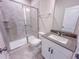 Modern bathroom with tiled shower, updated vanity, and neutral tones at 320 Duncan Creek Rd # 161, Lillington, NC 27546