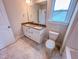 Bright bathroom with double sink vanity, large mirror, and a toilet at 320 Duncan Creek Rd # 161, Lillington, NC 27546
