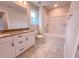 A clean bathroom with double vanity sink, large tub, and toilet at 320 Duncan Creek Rd # 161, Lillington, NC 27546