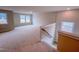 Spacious bonus room with plush carpeting and abundant natural light from multiple windows at 320 Duncan Creek Rd # 161, Lillington, NC 27546
