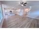 Bright, open living space with white kitchen and view of the stairway at 320 Duncan Creek Rd # 161, Lillington, NC 27546