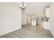 Modern open-concept kitchen with a central island, pendant lighting, and lots of natural light at 472 Traditions Grande Blvd # 34, Wake Forest, NC 27587