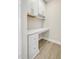 A bright home office space featuring built-in desk, cabinets, and drawers at 472 Traditions Grande Blvd # 34, Wake Forest, NC 27587